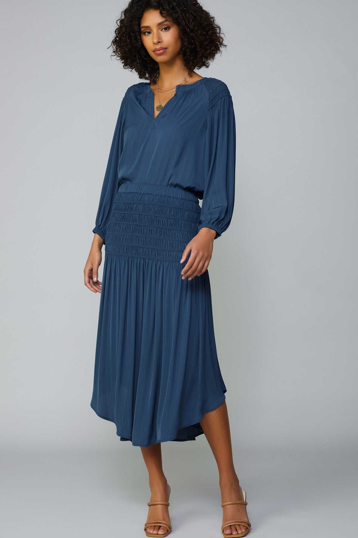 FRENCH NAVY SMOCKED WAIST WITH DIAGONAL CUT MIDI SKIRT